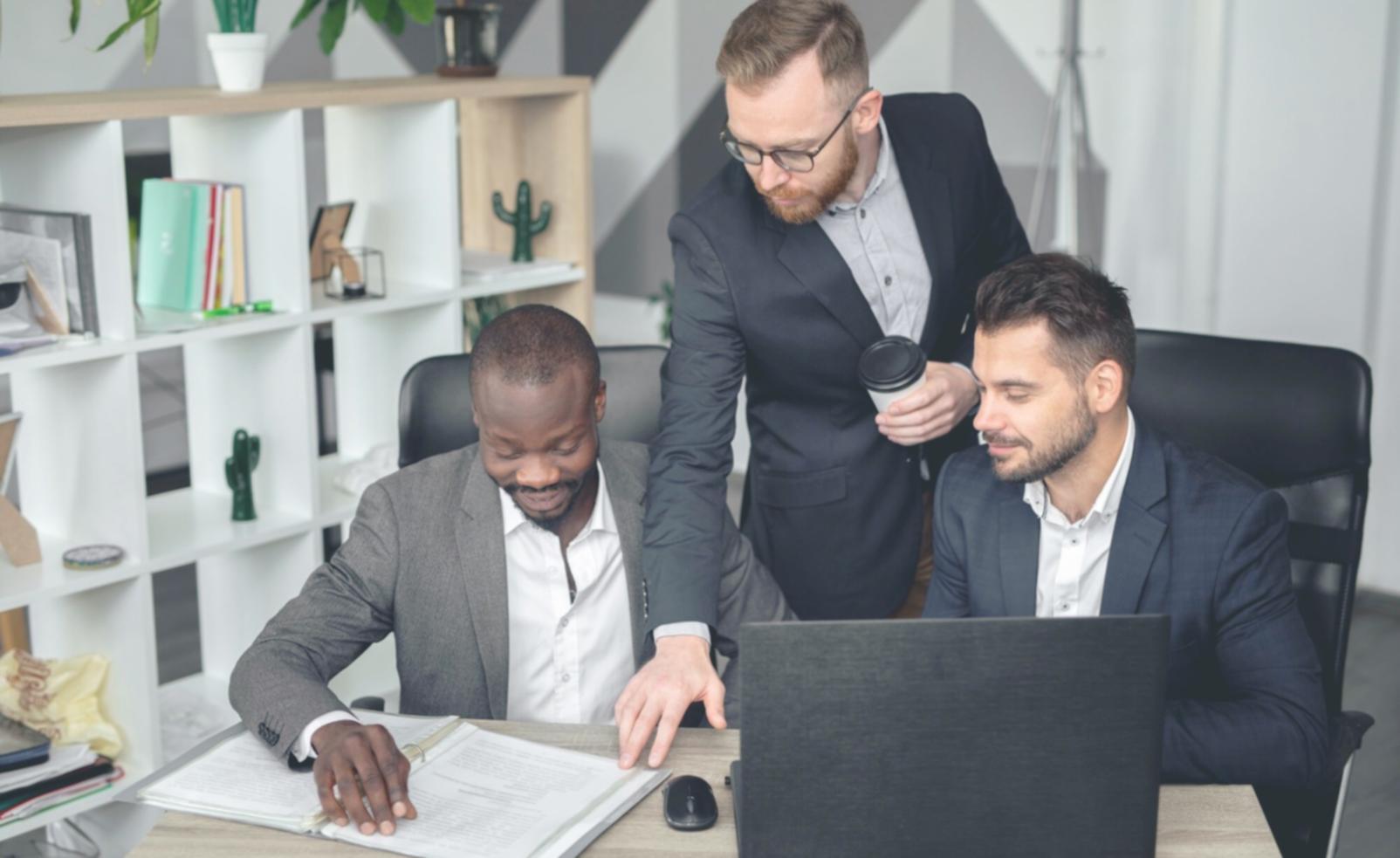 Person reviewing financial documents and budget planning materials
